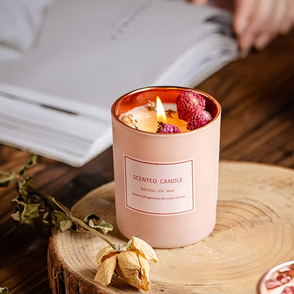 Pink scented candle accompanying gift