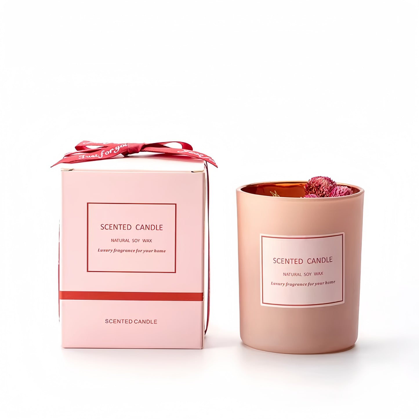 Pink scented candle accompanying gift